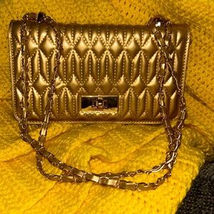 This is a gold purse that was bought and never used.